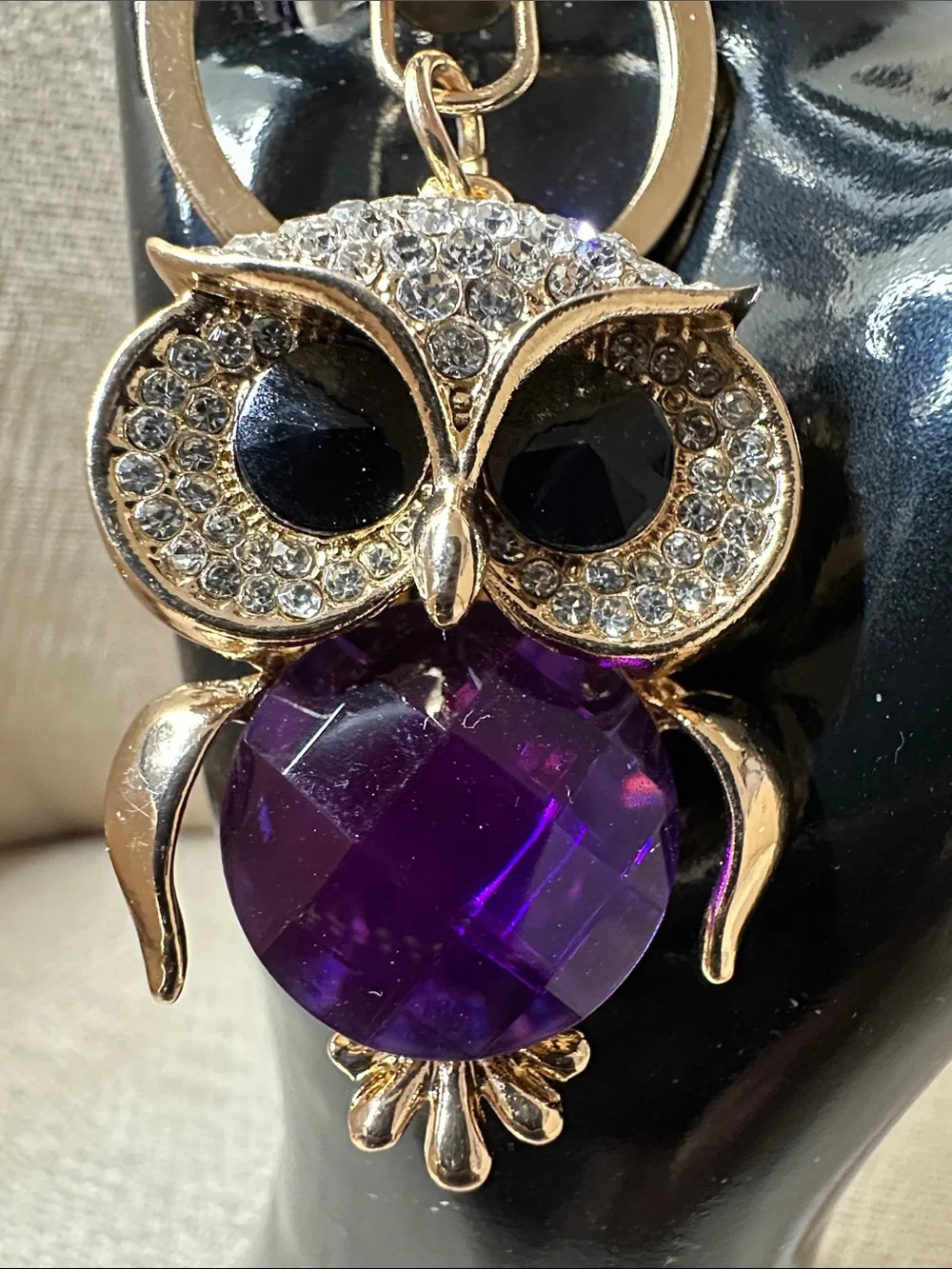 Gold-Tone Owl Keychain with Purple Crystal Accent